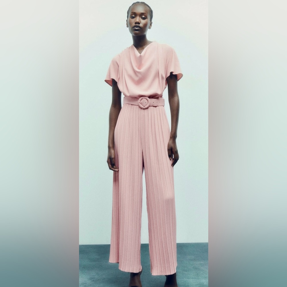 Pleated pant wide leg belted jump suit in pink/beige size medium from Zara.